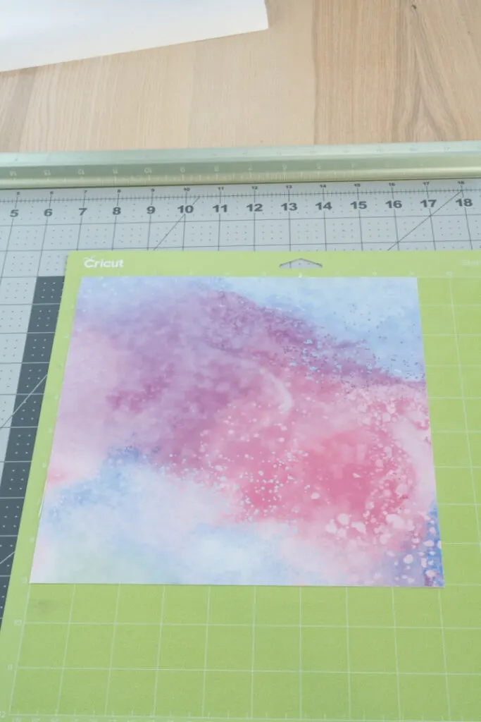 Infusible Ink transfer sheet on a cutting mat