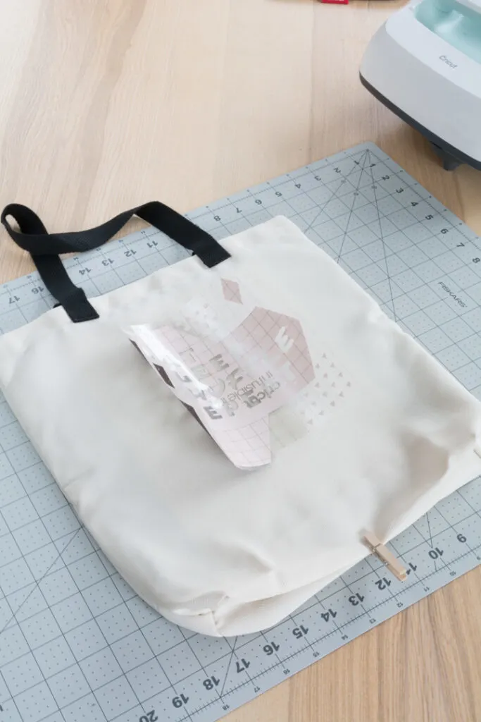 transferring the Infusible Ink design to the tote bag