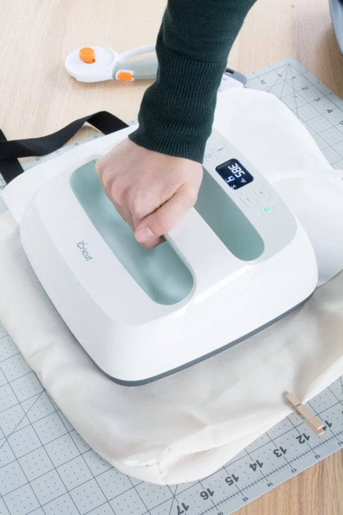 transferring the Infusible Ink design to the tote bag using an EasyPress 2