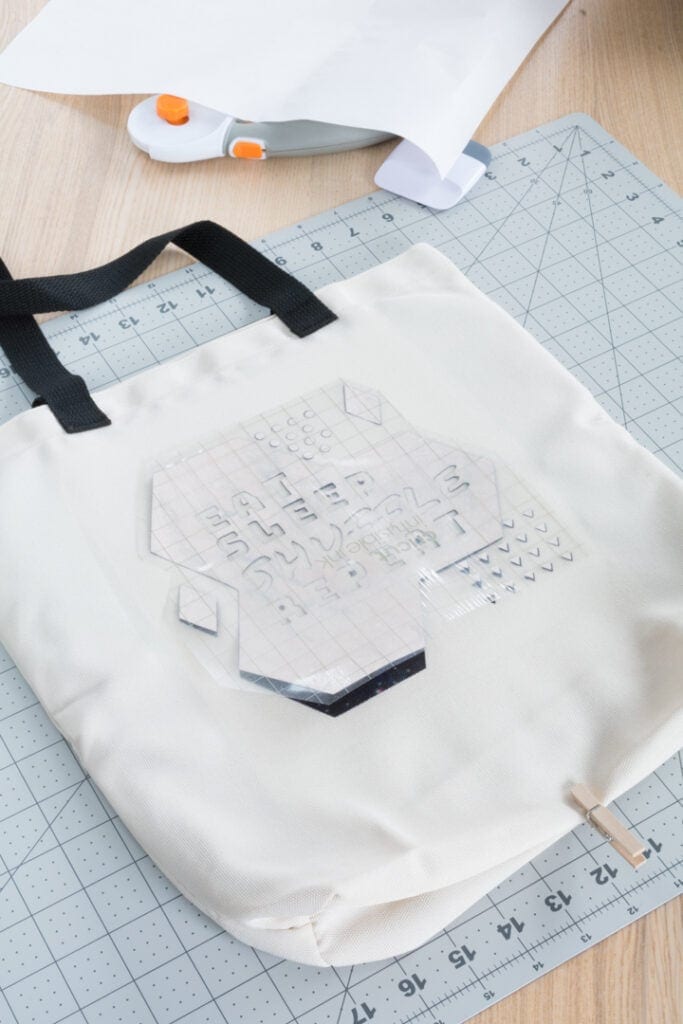 transferring the Infusible Ink design to the tote bag