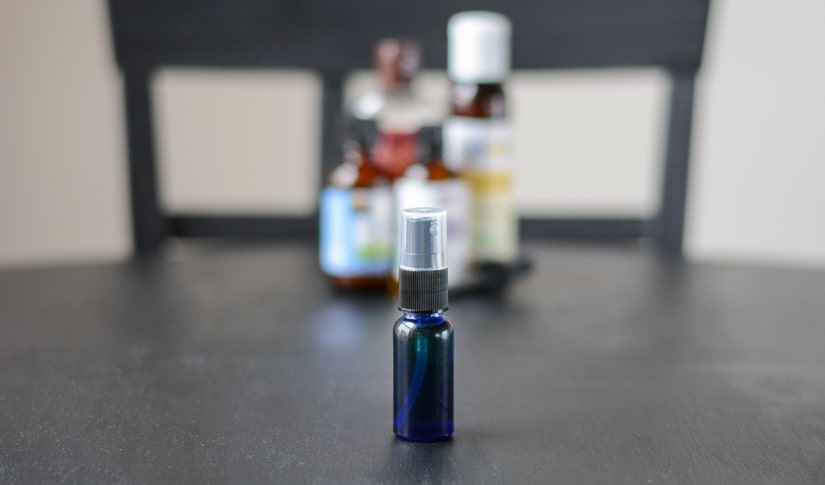 small spray bottle filled with homemade beard oil