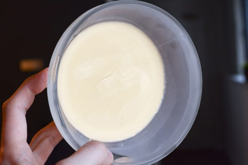 cold DIY body butter in a bowl before whipping it
