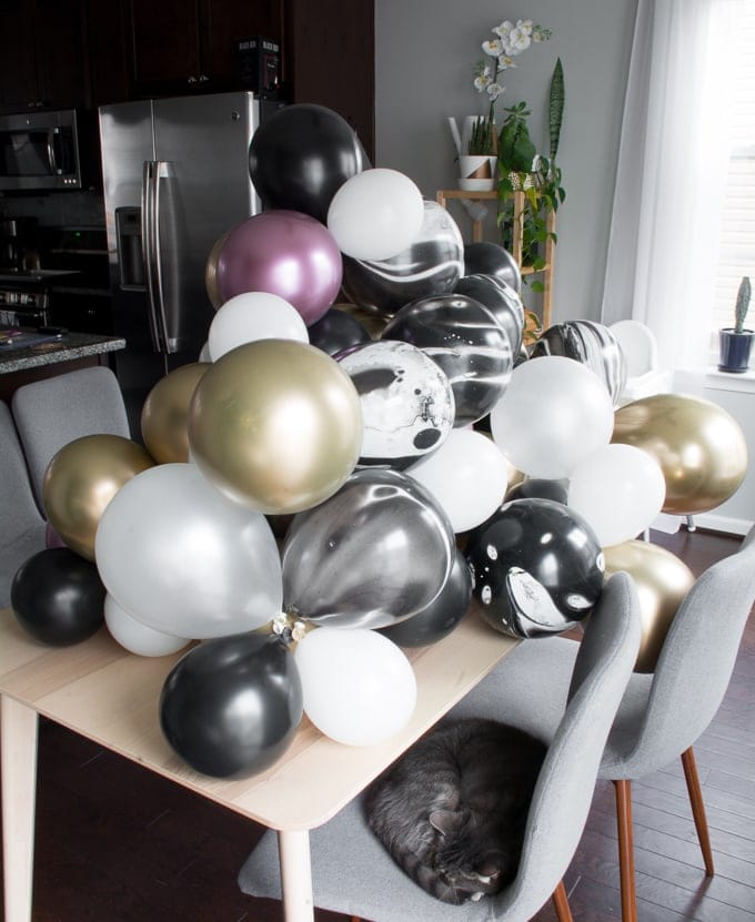 easy balloon garland made using balloons and string