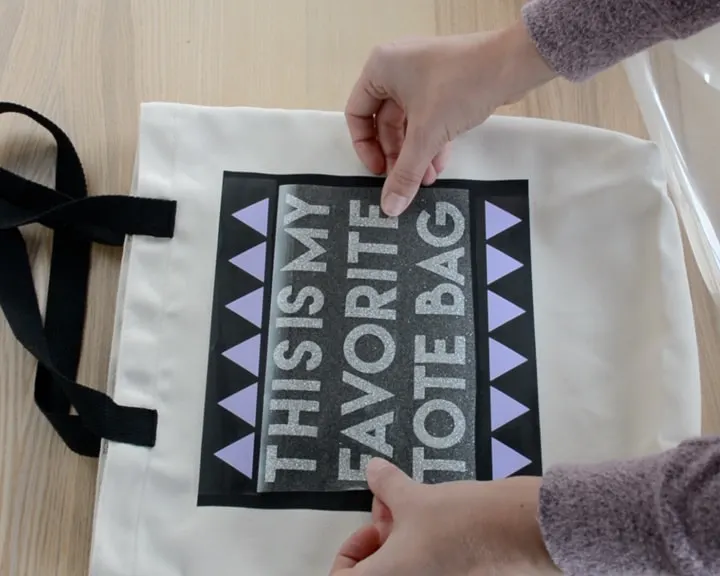 layering iron-on vinyl to make a tote bag