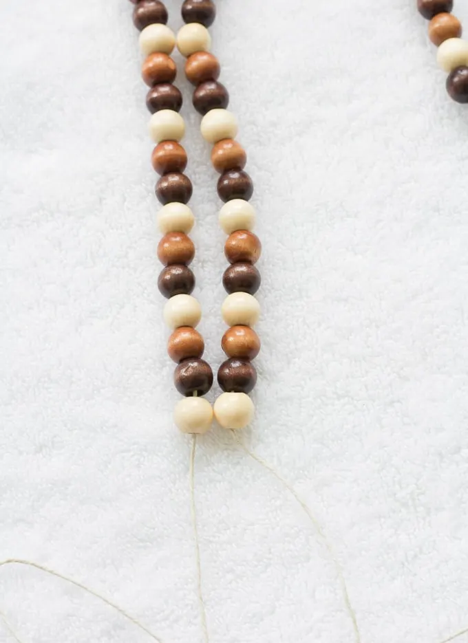 threading wooden beads