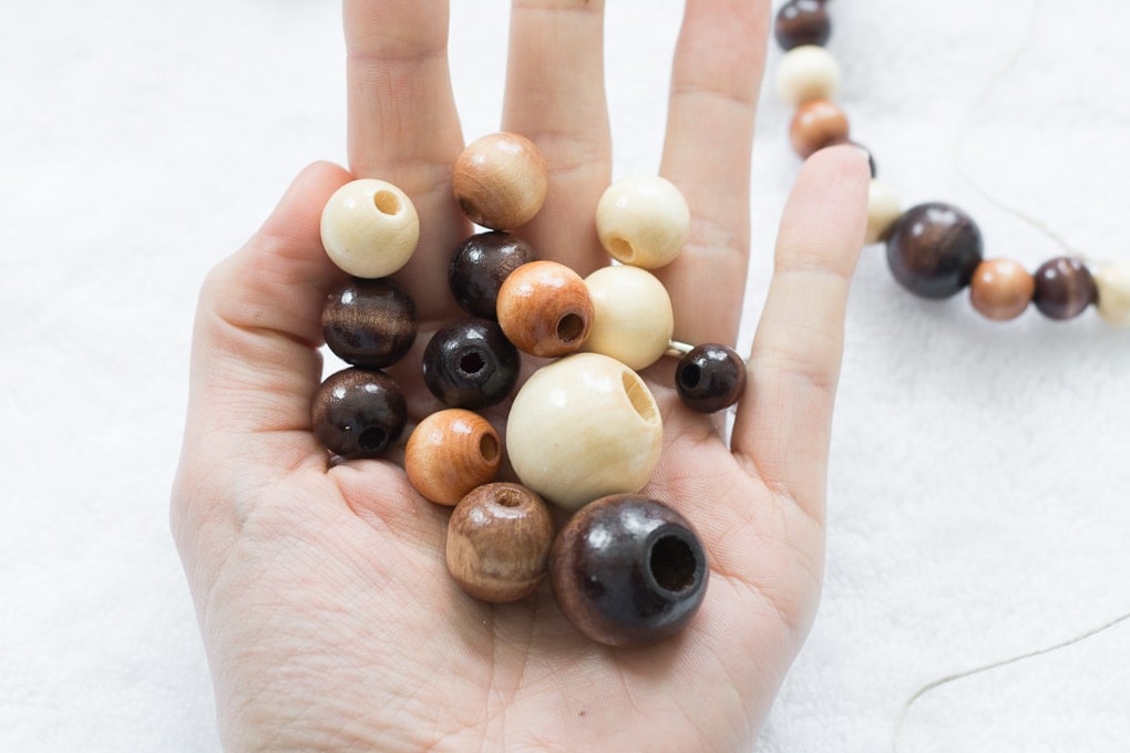 wooden beads in a hand