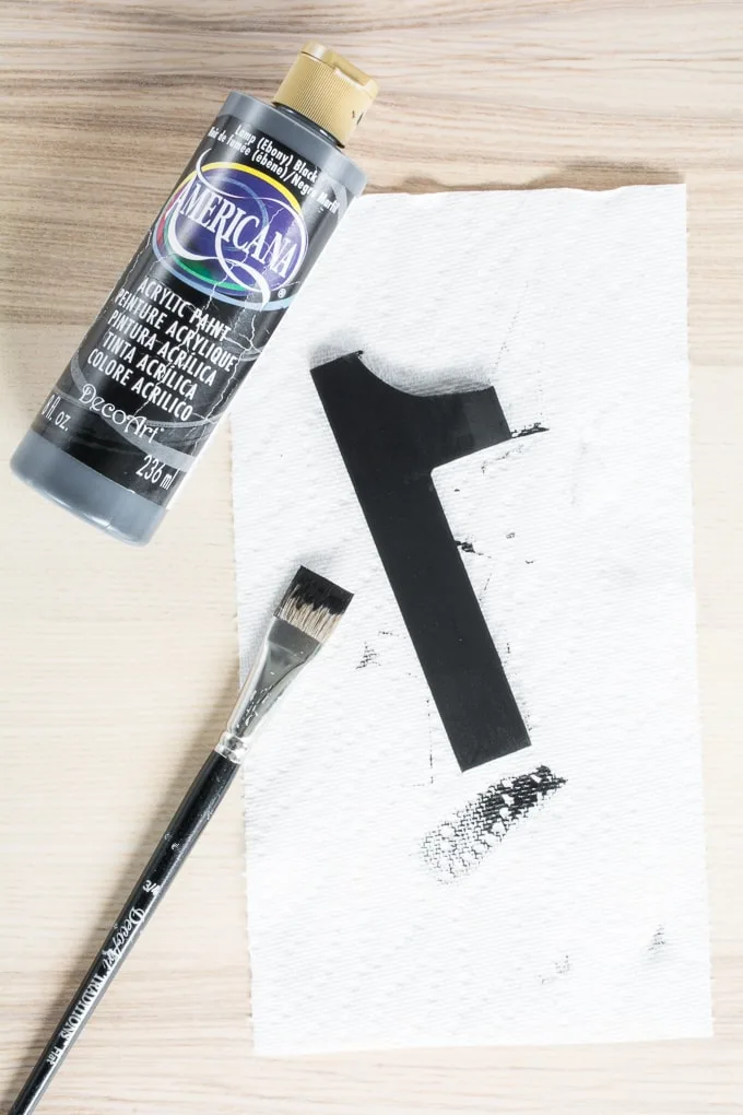 painting a wooden number 1 black