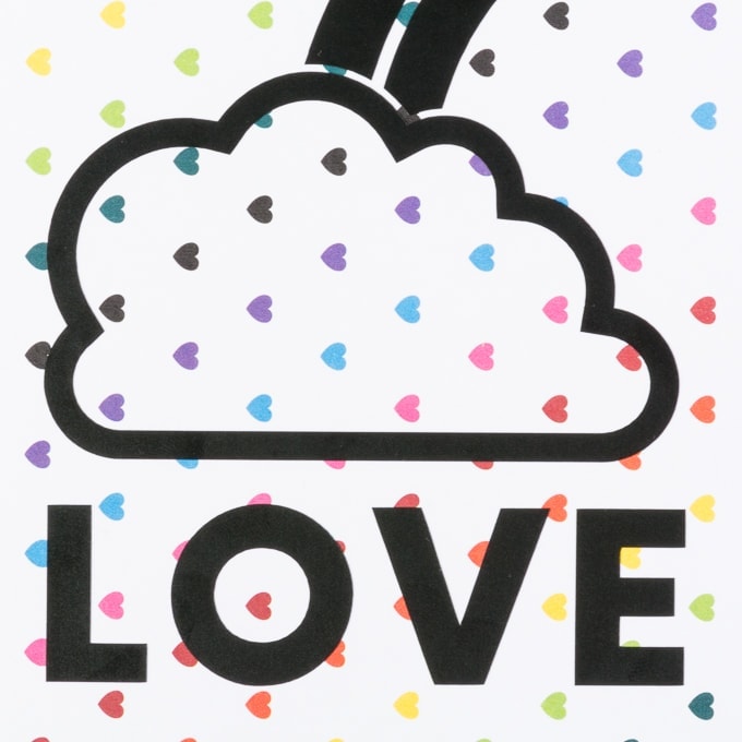 piece of paper with rainbow hearts that says LOVE
