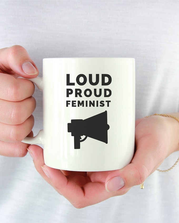 feminist coffee mug that says loud proud feminist with a megaphone