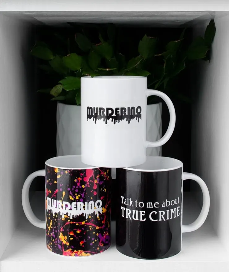 mugs made on the Cricut mug press that say "murderino" and "talk to me about true crime"