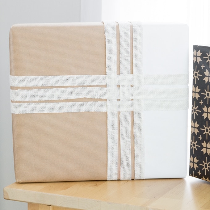 paint-dipped gift wrap with burlap ribbon