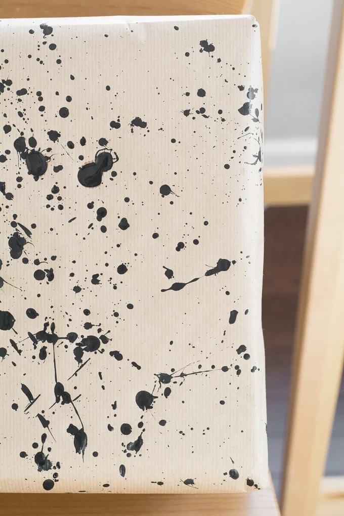 DIY wrapping paper made using paint splatters