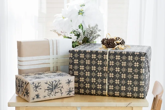 presents wrapped in DIY wrapping paper on a table