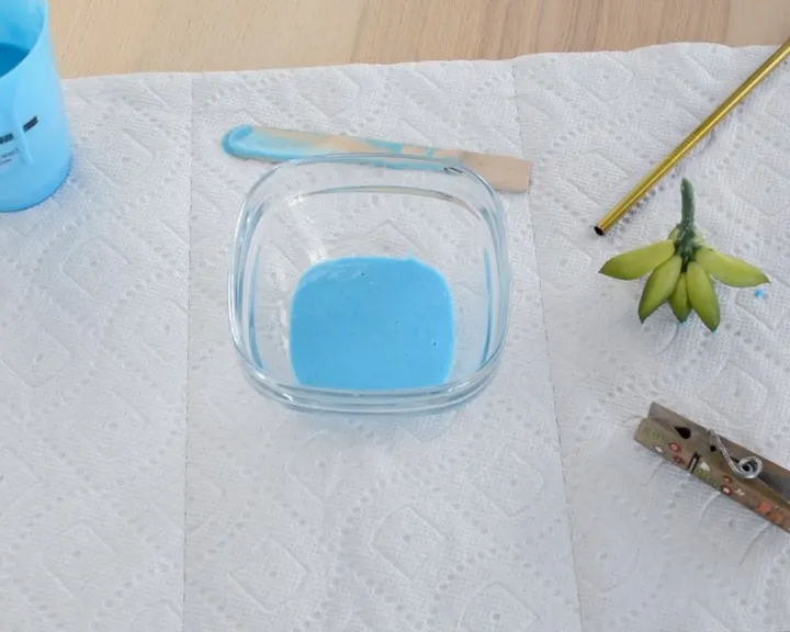 pouring a two-part liquid silicone mixture into a bowl