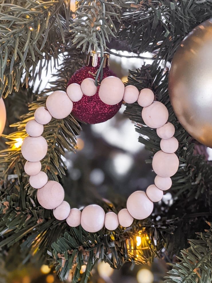 DIY wood bead ornament on a Christmas tree