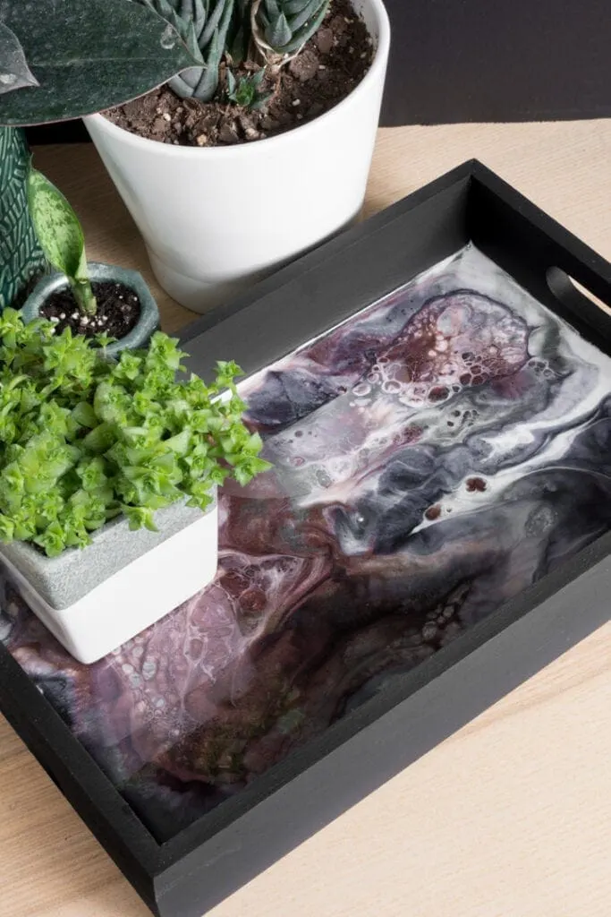 finished resin and wood tray with a plant on it
