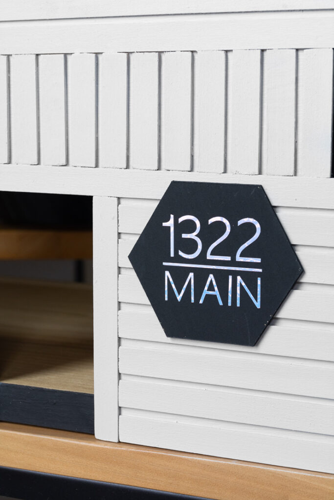 Finished DIY house number for a dollhouse made using a Cricut machine