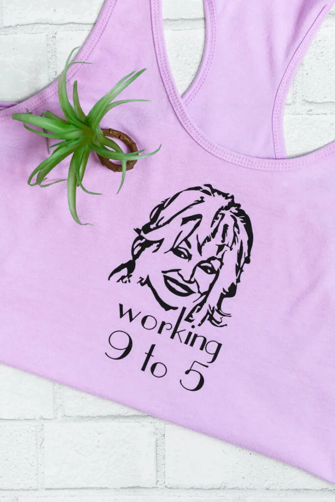 Dolly parton svg file with her face and the text working 9 to 5 on a tank top
