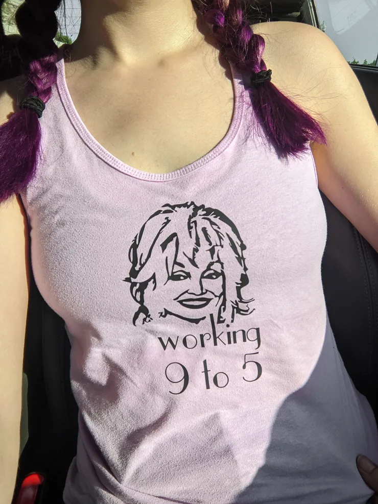 woman in a tank top with a picture of dolly parton on it and the text working 9 to 5