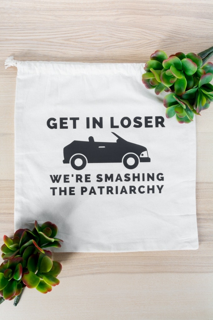 bag that says get in loser we're smashing the patriarchy 