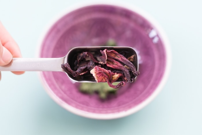dried hibiscus in a spoon