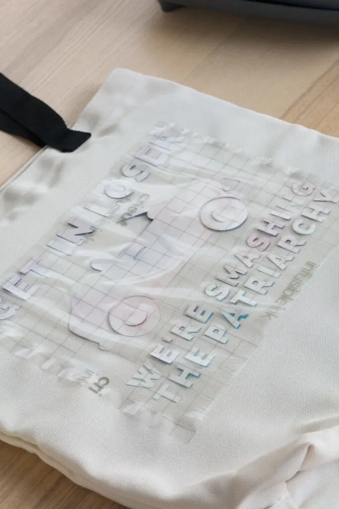 applying infusible ink to a tote bag