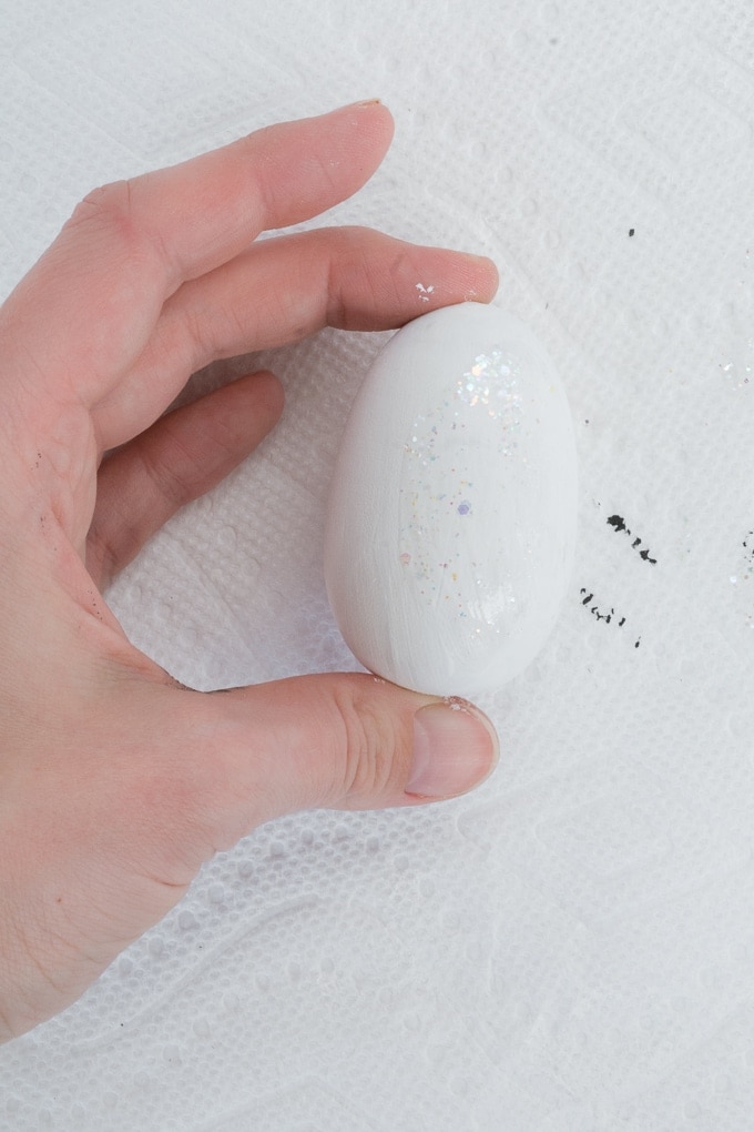 painting a wooden egg