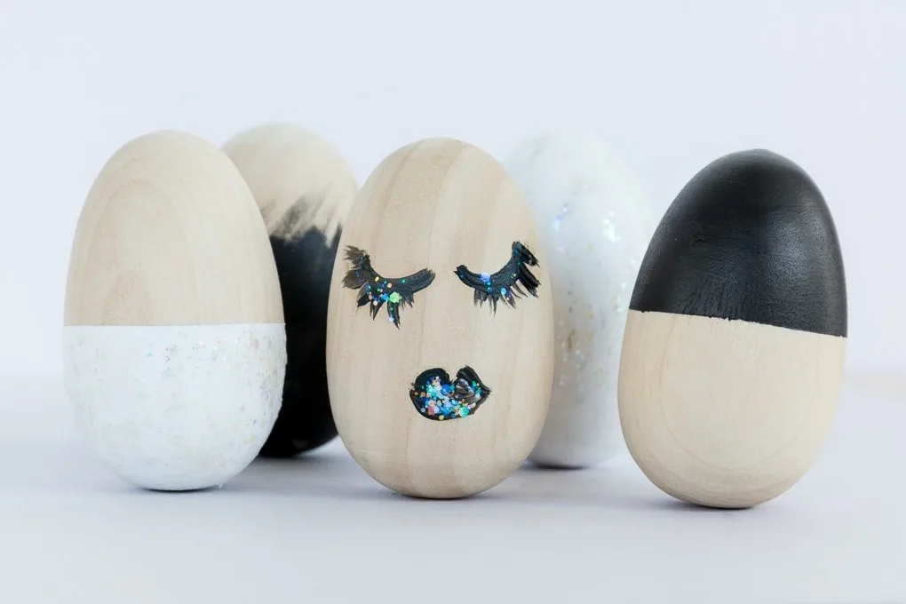 modern painted easter eggs laying on a table