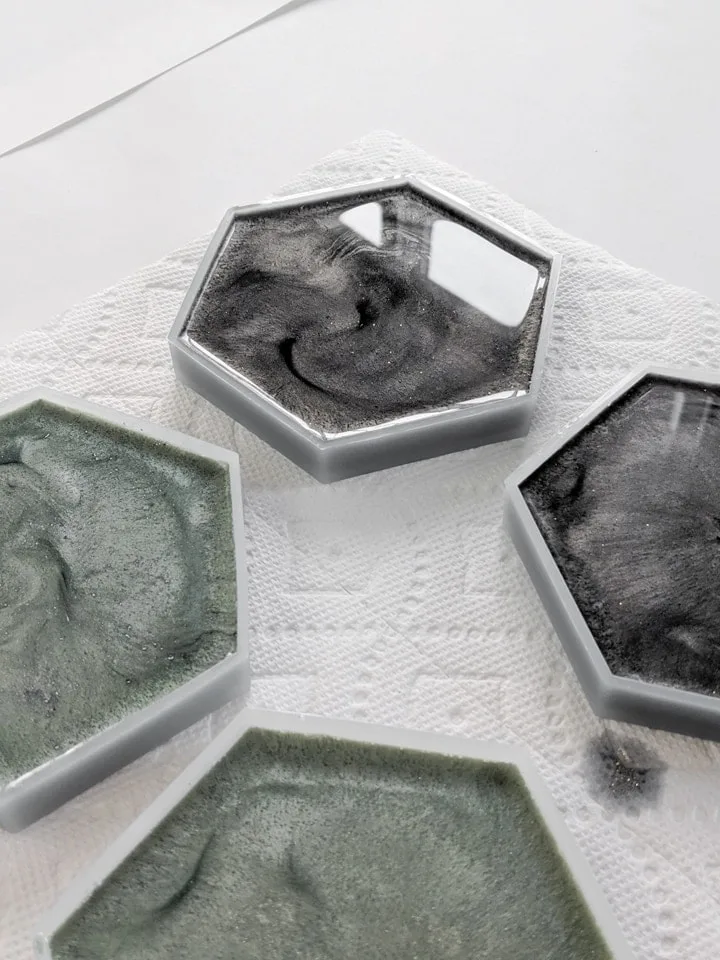 resin pouring into silicone coaster molds