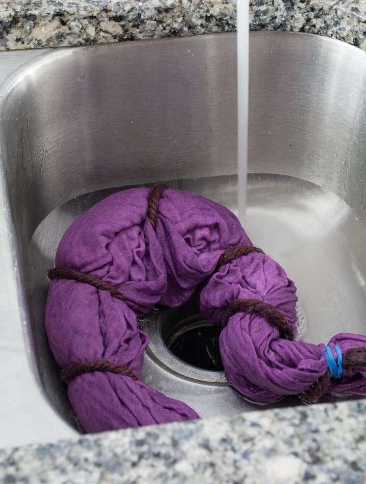 rinsing the dyed blanket