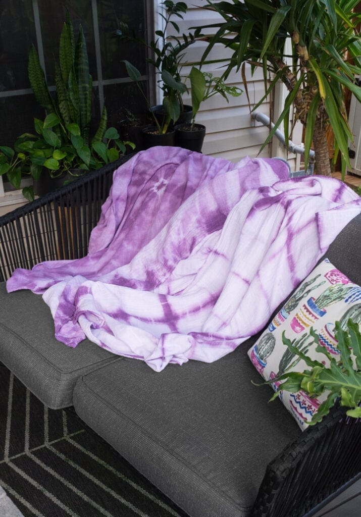 shibori blankets on an outdoor patio