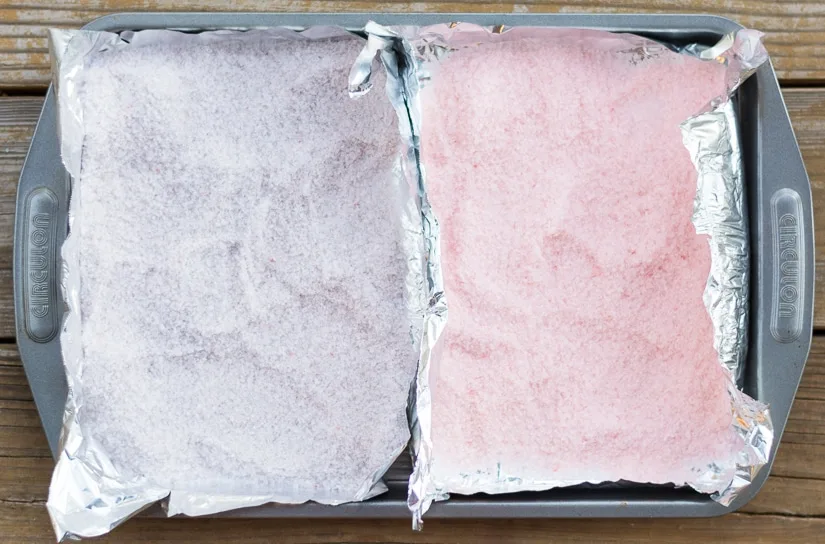 colored bath salts on a pan for baking