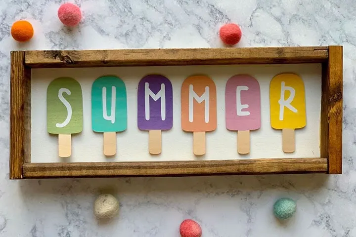 wooden and vinyl summer popsicle sign made using a Cricut Maker knife blade