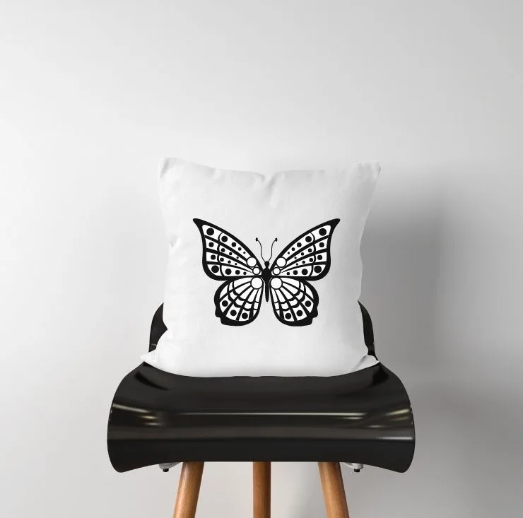free fancy butterfly SVG file mocked up on a pillow
