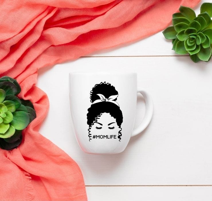 free messy bun svg file for black hair mocked up onto a coffee cup