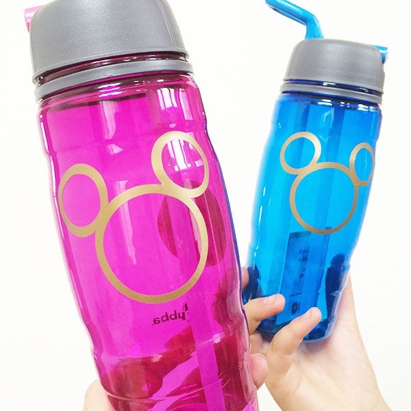 pink and blue water bottles with mickey mouse emblem