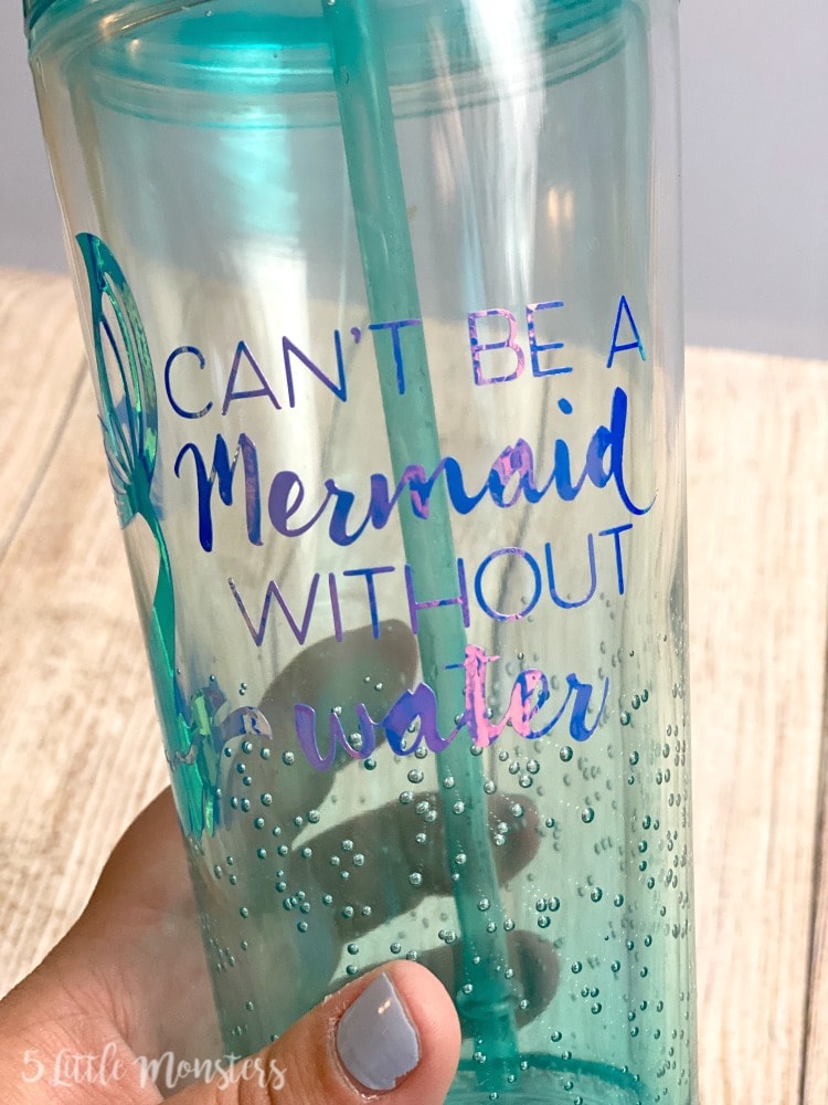 water bottle with mermaid image and saying