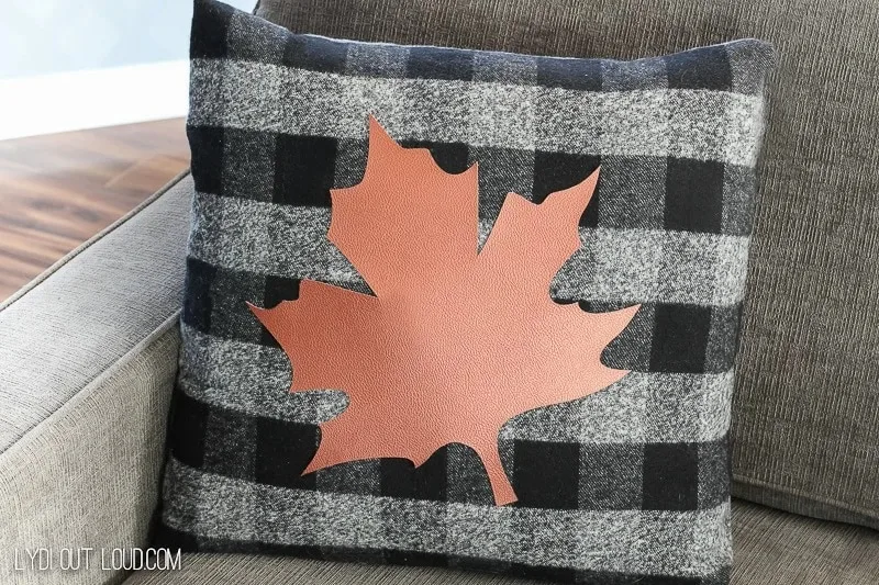 buffalo checked pillow with leather maple leaf