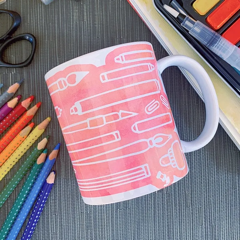 art supplies graphic on a mug