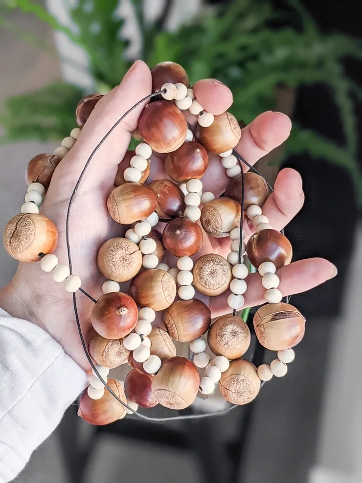 DIY fall garland with wood beads and acorns