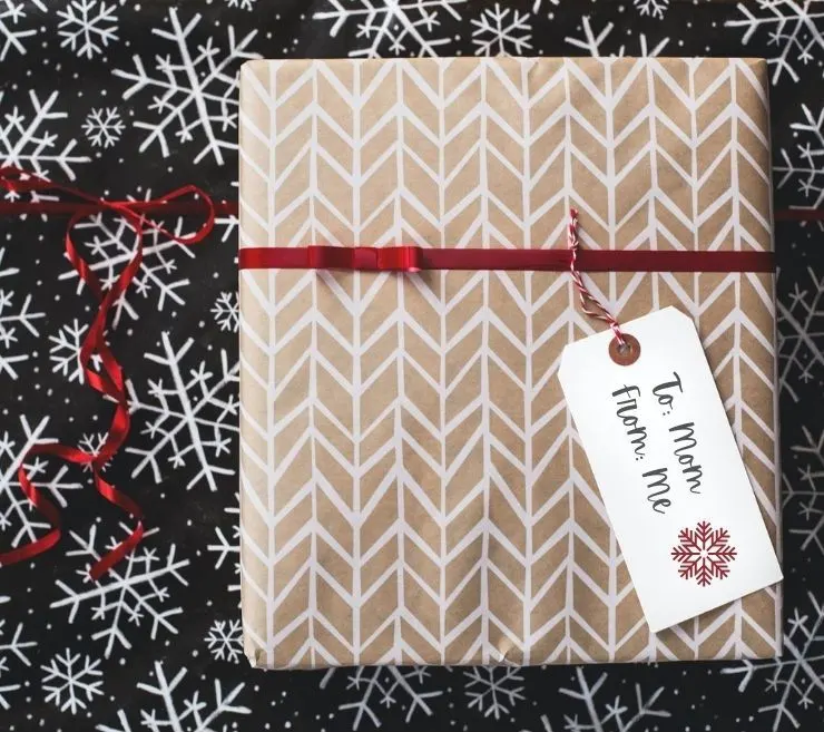 christmas present with a snowflake gift tag