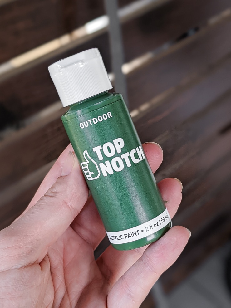bottle of top notch green paint