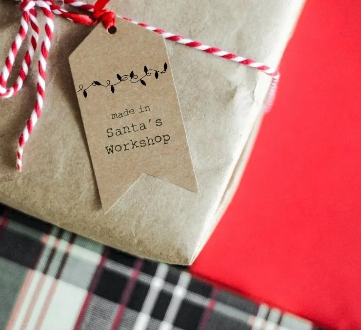 brown paper gift tag that says made in santa's workshop