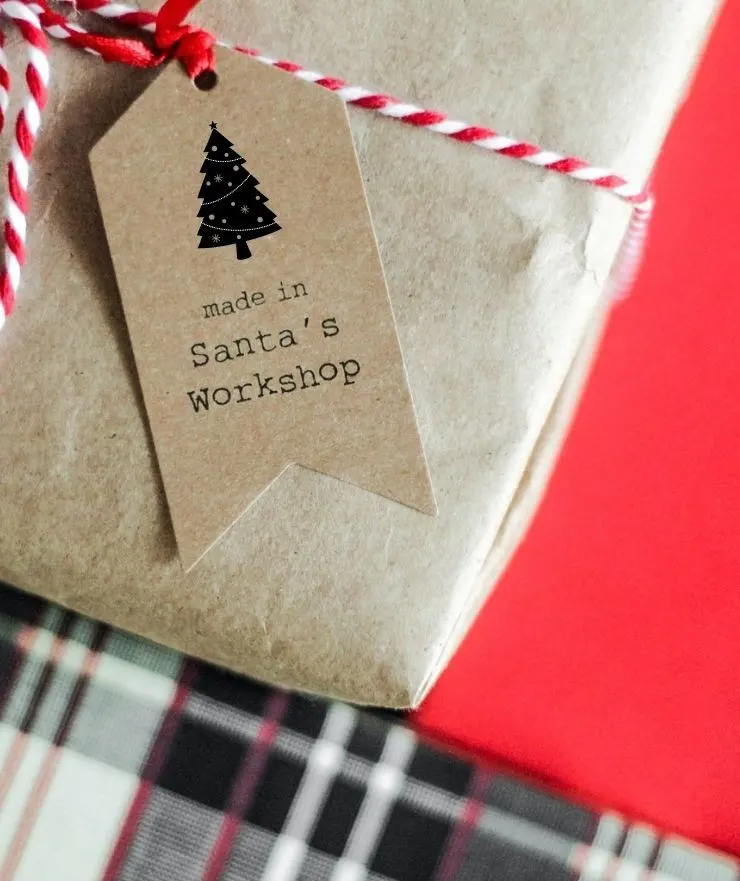 gift tag that has a Christmas tree and text that says made in Santa's workshop