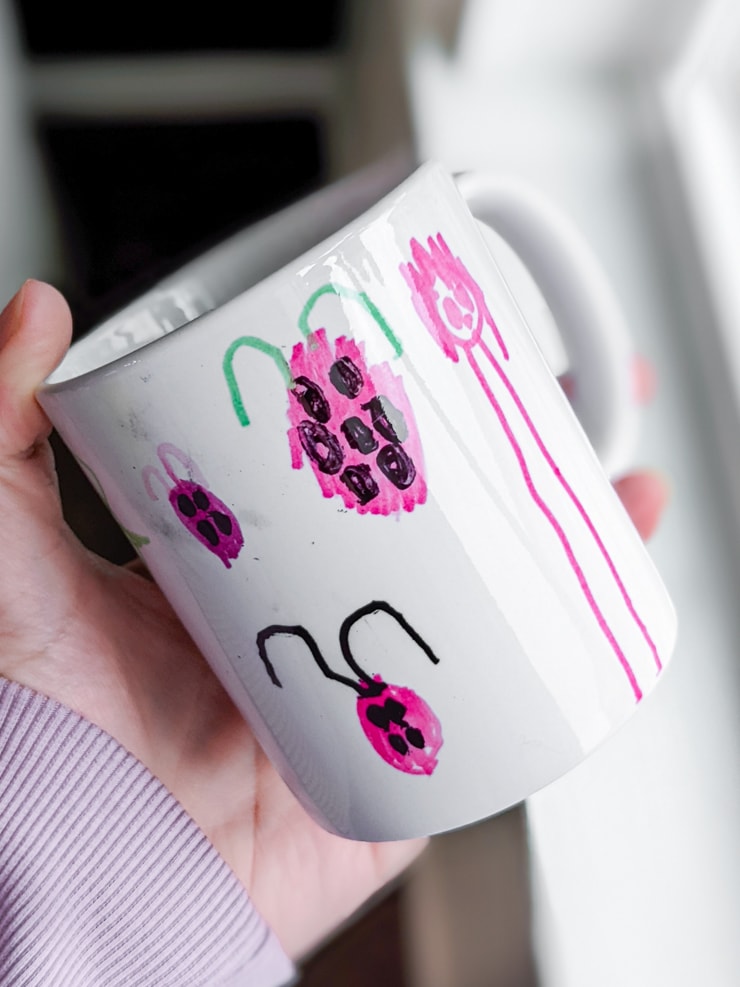 kids drawing transferred onto a mug using infusible ink