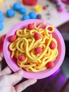 noodles and meatballs made of playdough