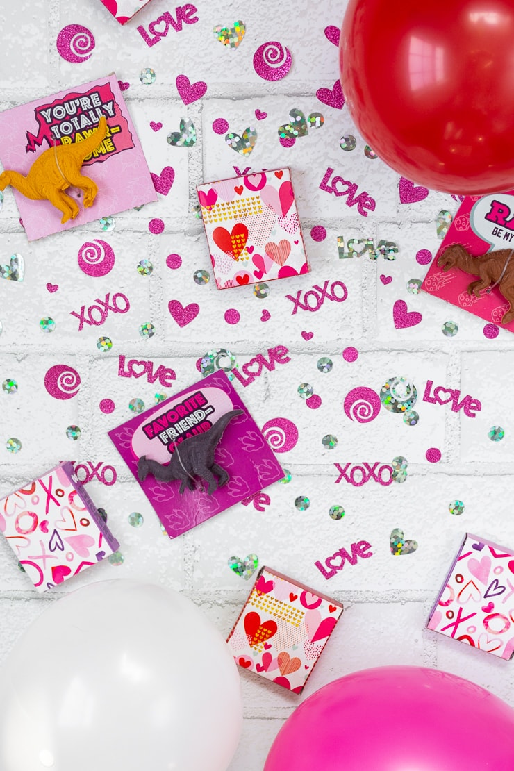 styled flat lay image showing confetti made with a Cricut machine and valentines