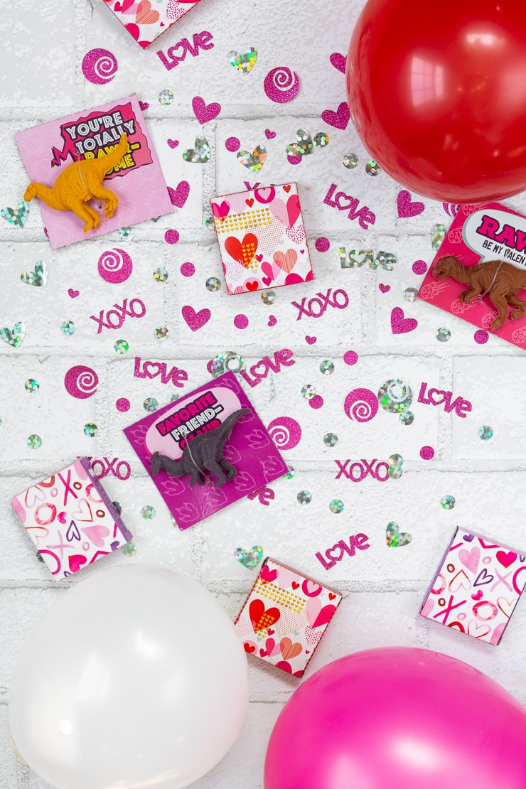 styled flat lay image showing confetti made with a Cricut machine and valentines