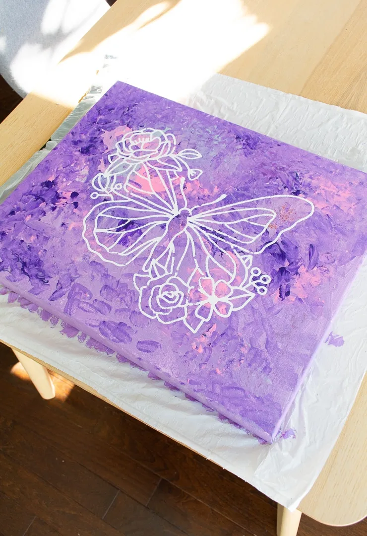 DIY butterfly canvas art made using acrylic paint