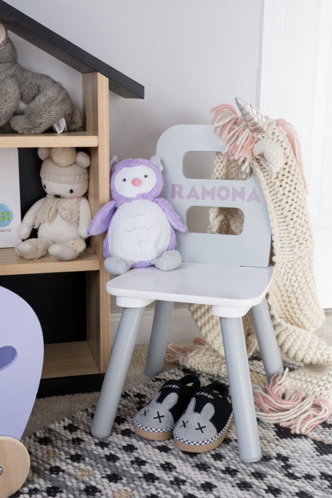 children's chair with a vinyl decal on it saying RAMONA